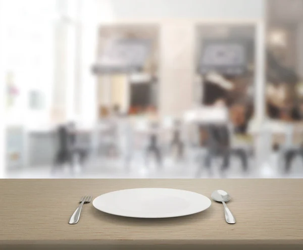 Tischplatte und verschwimmen Restaurant des Hintergrunds — Stockfoto