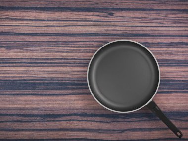 Tablo arka plan üzerinde Üstten Görünüm boş tava