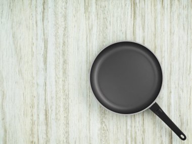 Tablo arka plan üzerinde Üstten Görünüm boş tava