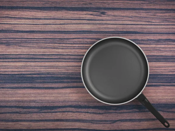 Tablo arka plan üzerinde Üstten Görünüm boş tava