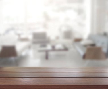 Masa üstü ve arka planın bulanık oturma odası