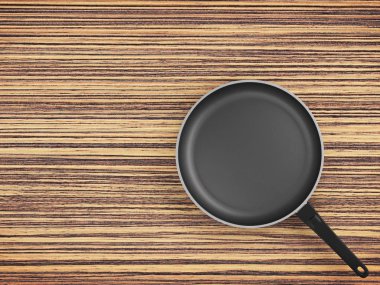 Tablo arka plan üzerinde Üstten Görünüm boş tava