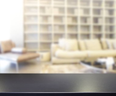 Masa üstü ve arka planın bulanık oturma odası