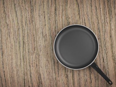 Tablo arka plan üzerinde Üstten Görünüm boş tava