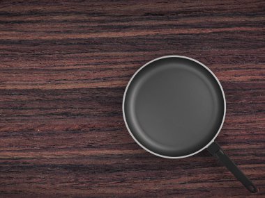 Tablo arka plan üzerinde Üstten Görünüm boş tava