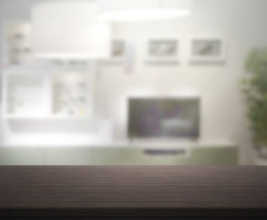 Masa üstü ve arka planın bulanık oturma odası