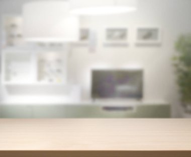 Masa üstü ve arka planın bulanık oturma odası