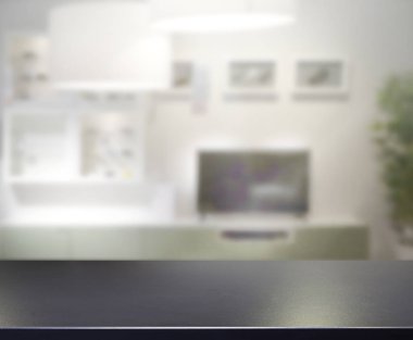 Masa üstü ve arka planın bulanık oturma odası