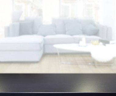 Masa üstü ve arka planın bulanık oturma odası