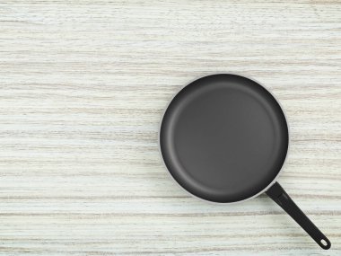 Tablo arka plan üzerinde Üstten Görünüm boş tava