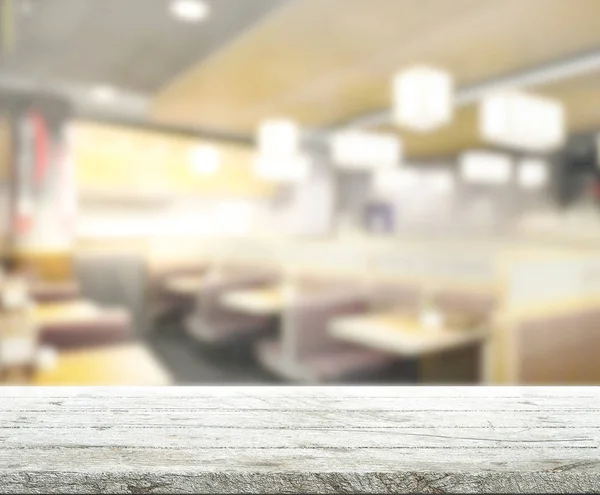 Tafelblad en wazig restaurant van de achtergrond — Stockfoto