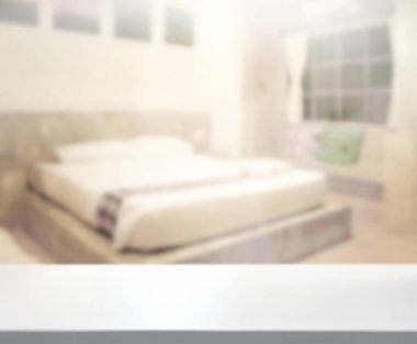 Masa üstü ve bulanıklık arka planda yatak odası