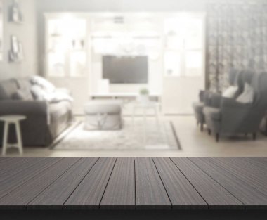 Masa üstü ve arka planın bulanık oturma odası