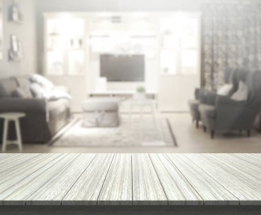 Masa üstü ve arka planın bulanık oturma odası