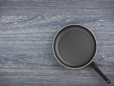 Tablo arka plan üzerinde Üstten Görünüm boş tava