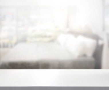 Masa üstü ve bulanıklık arka planda yatak odası