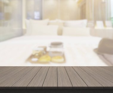 Masa üstü ve bulanıklık arka planda yatak odası