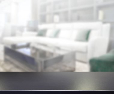 Masa üstü ve arka planın bulanık oturma odası