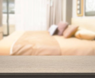 Masa üstü ve bulanıklık arka planda yatak odası