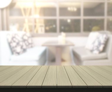 Arka plandaki masa üstü ve bulanık restoran