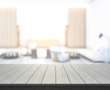 Masa üstü ve arka planın bulanık oturma odası