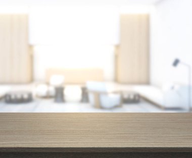 Masa üstü ve arka planın bulanık oturma odası