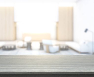 Masa üstü ve arka planın bulanık oturma odası