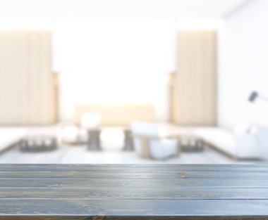 Masa üstü ve arka planın bulanık oturma odası