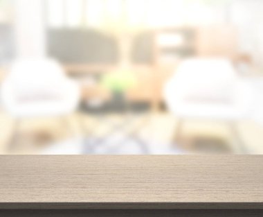 Masa üstü ve arka planın bulanık oturma odası