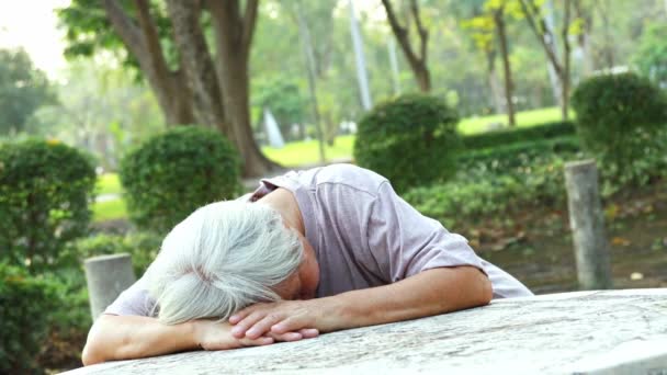 Sick asian senior woman fainted unconscious at the table, fall face down,elderly female patient stop breathing due to heart failure, cardiac arrest,severe arrhythmia, sudden unexpected death syndrome — Stock Footage Sick Asian Senior Woman Fainted Unconscious Table Fall Face Elderly Stock Footage