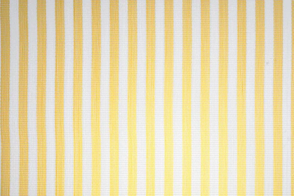 Тканина скатертини з жовтими та білими лініями (деградована лампочка). Домашня тканина . — стокове фото