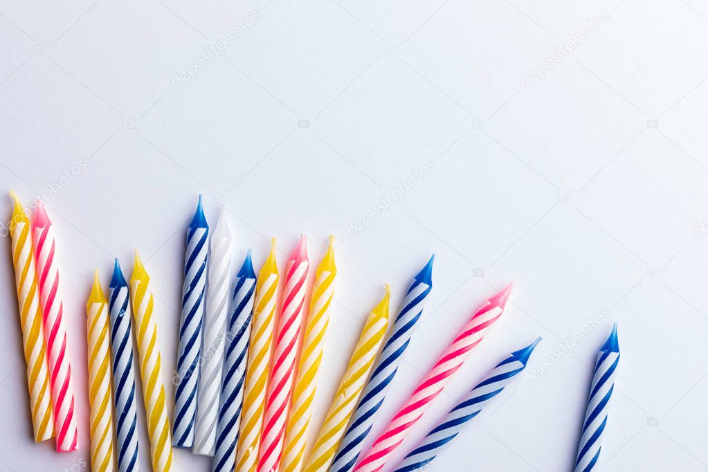 Group of birthday candles on white background. For birthday gree