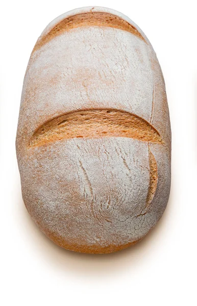 Chleb wiejski pełnoziarnisty. Odizolowany na białym tle. Widok boczny. — Zdjęcie stockowe
