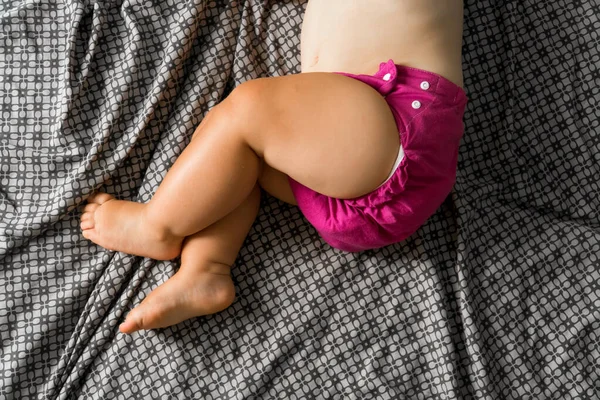 Sleeping baby with cloth diaper. Top view. Ecology reusable organic diaper. Copy space — Stock Photo, Image