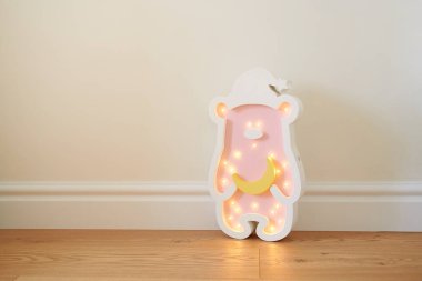 Teddy bear led nightlight for baby room clipart