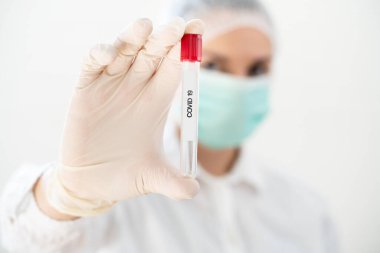 Doctor in laboratory doing text in tube. Virology. covid19 vaccine