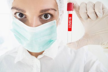 Doctor in laboratory doing text in tube. Virology. covid19 vaccine