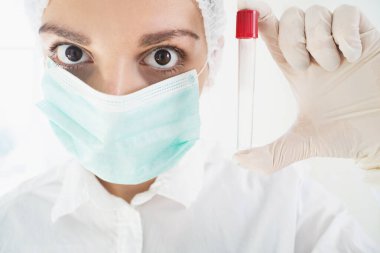 Doctor in laboratory doing text in tube. Virology. covid19 vaccine