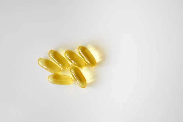 Organic omega 3 pills in flower shape — Stock Photo, Image
