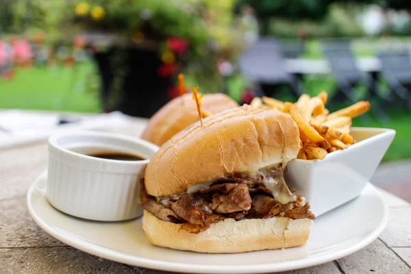 Beef dip with french fries — Stock Photo, Image