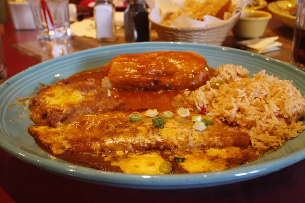 Authentic beef enchiladas in LA eatery — Stock Photo, Image