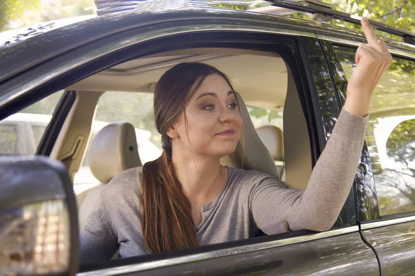 Young Attractive Caucasian Woman Shows Obscene Gesture Middle Finger Car — Stockfoto