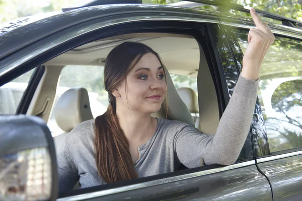 Young Attractive Caucasian Woman Shows Obscene Gesture Middle Finger Car — Stock Photo, Image