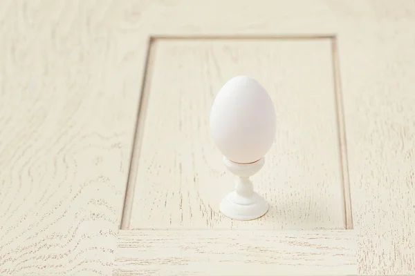 One egg wooden stand. Getting ready for the Easter holiday.