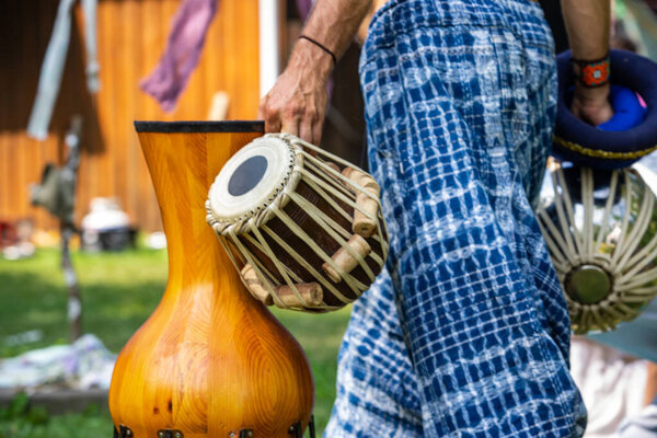 spiritual man holding music instruments
