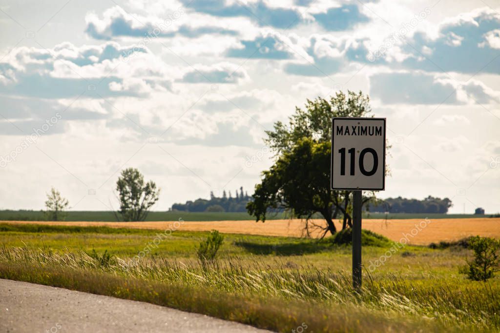 110 km maximum speed limit sign