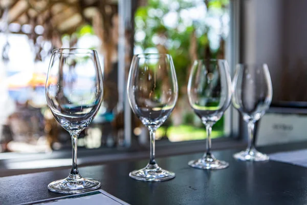 empty wine glasses on restaurant table