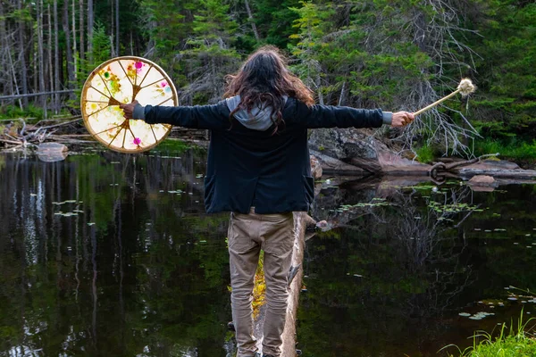 Man with sacred drum and fir stick standing — 스톡 사진