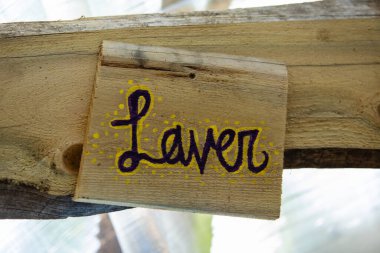 Earth festival tent rustic wash sign