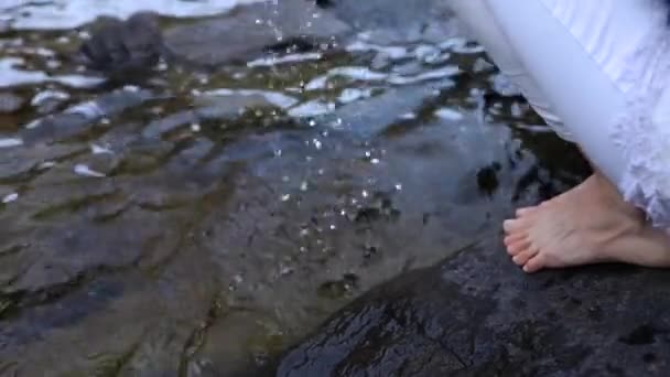 Hands picking up water — Stock Video